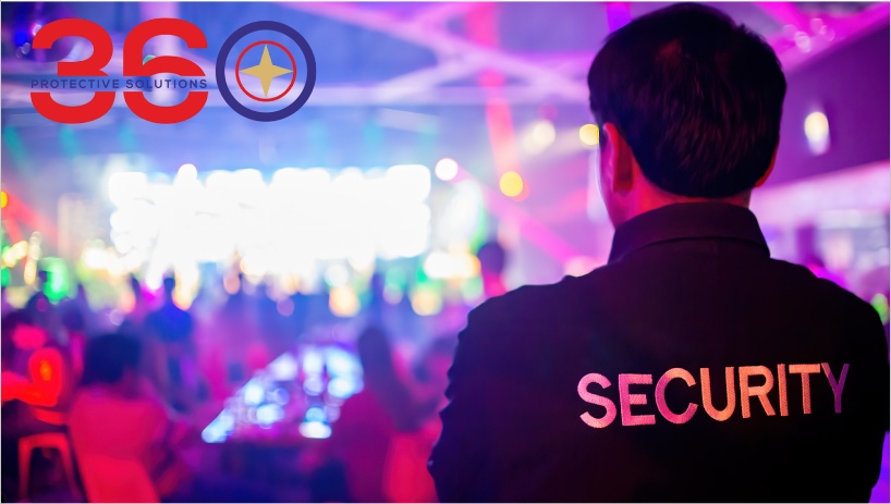 Event security personnel monitoring crowd at a concert, ensuring safety and order.